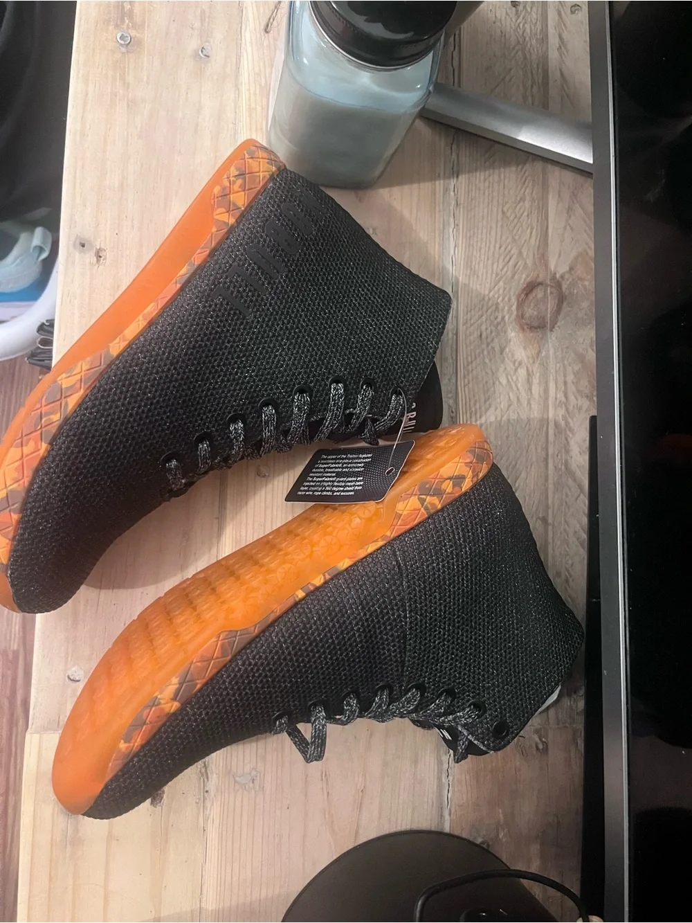 NOBULL Black Knit High-Top Trainers with Orange Sole